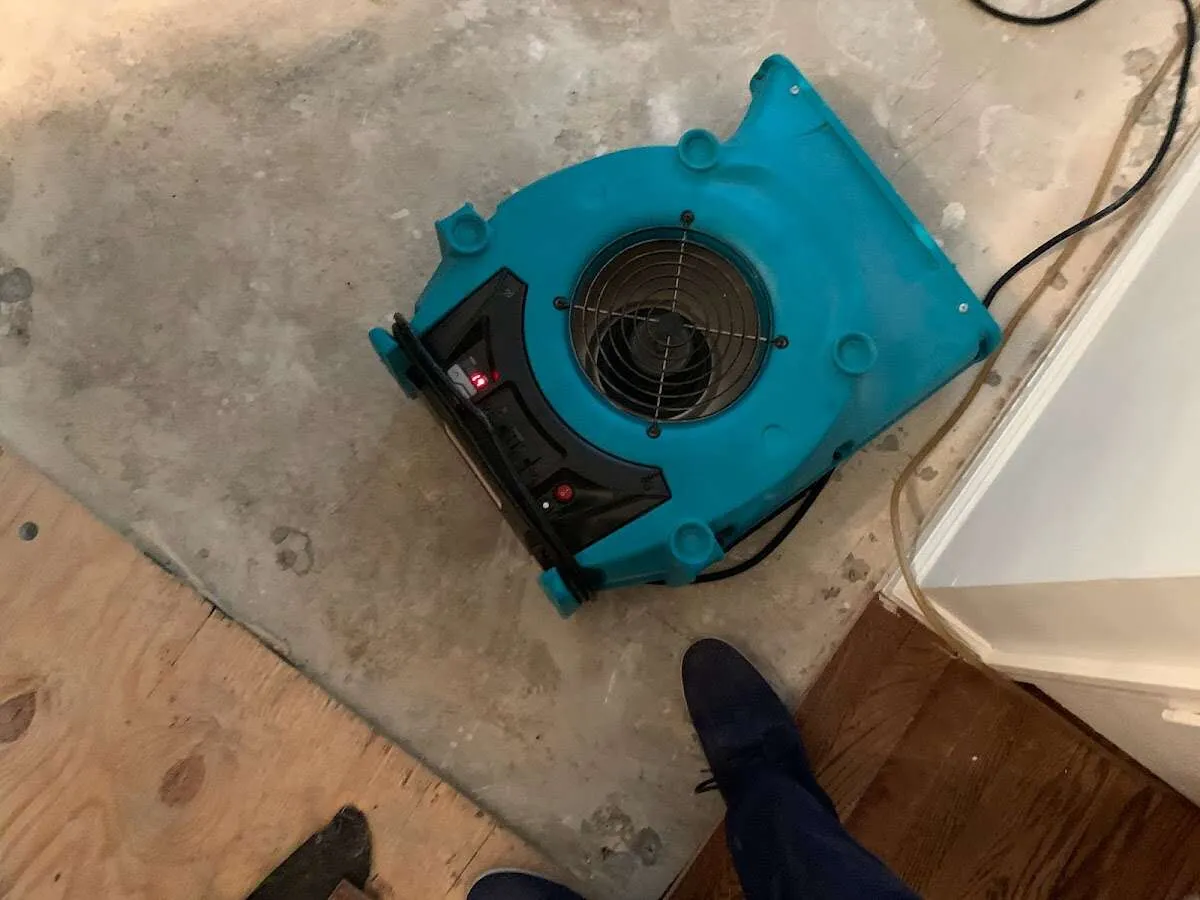 Air mover drying subfloor during Leak Detection & Repair in Bay Village