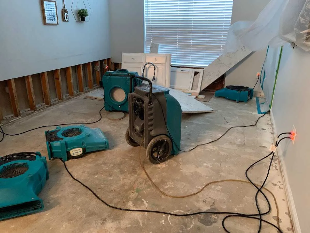 Dehumidifier in flood-cut room for Water Damage Restoration in Bay Village
