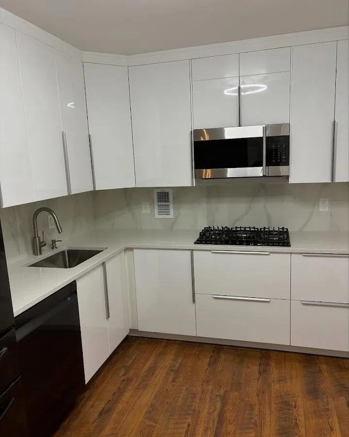 Restored kitchen with white cabinets after water damage in Bay Village